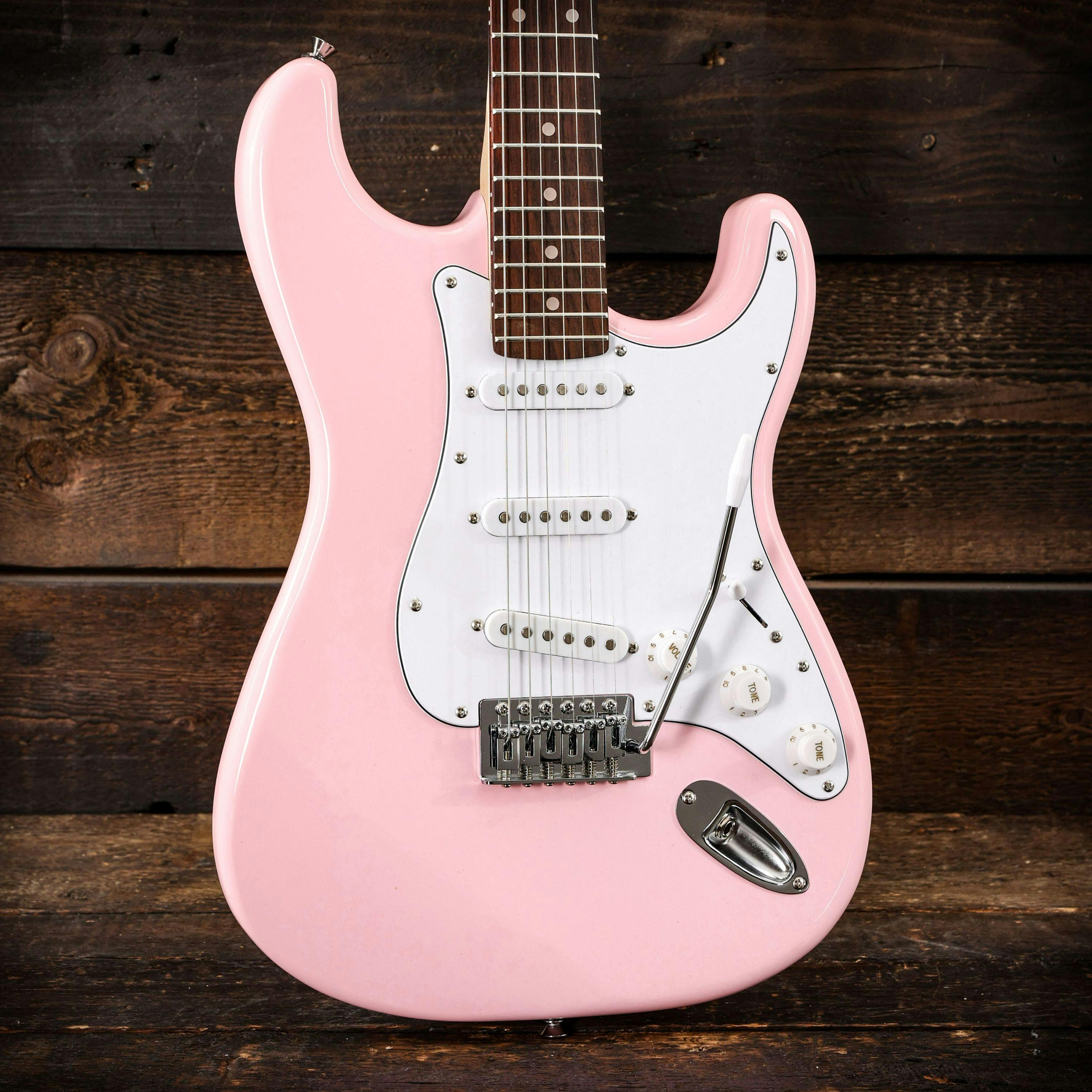 Pink and black store electric guitar